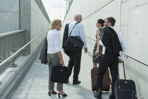 four colleagues on business travel